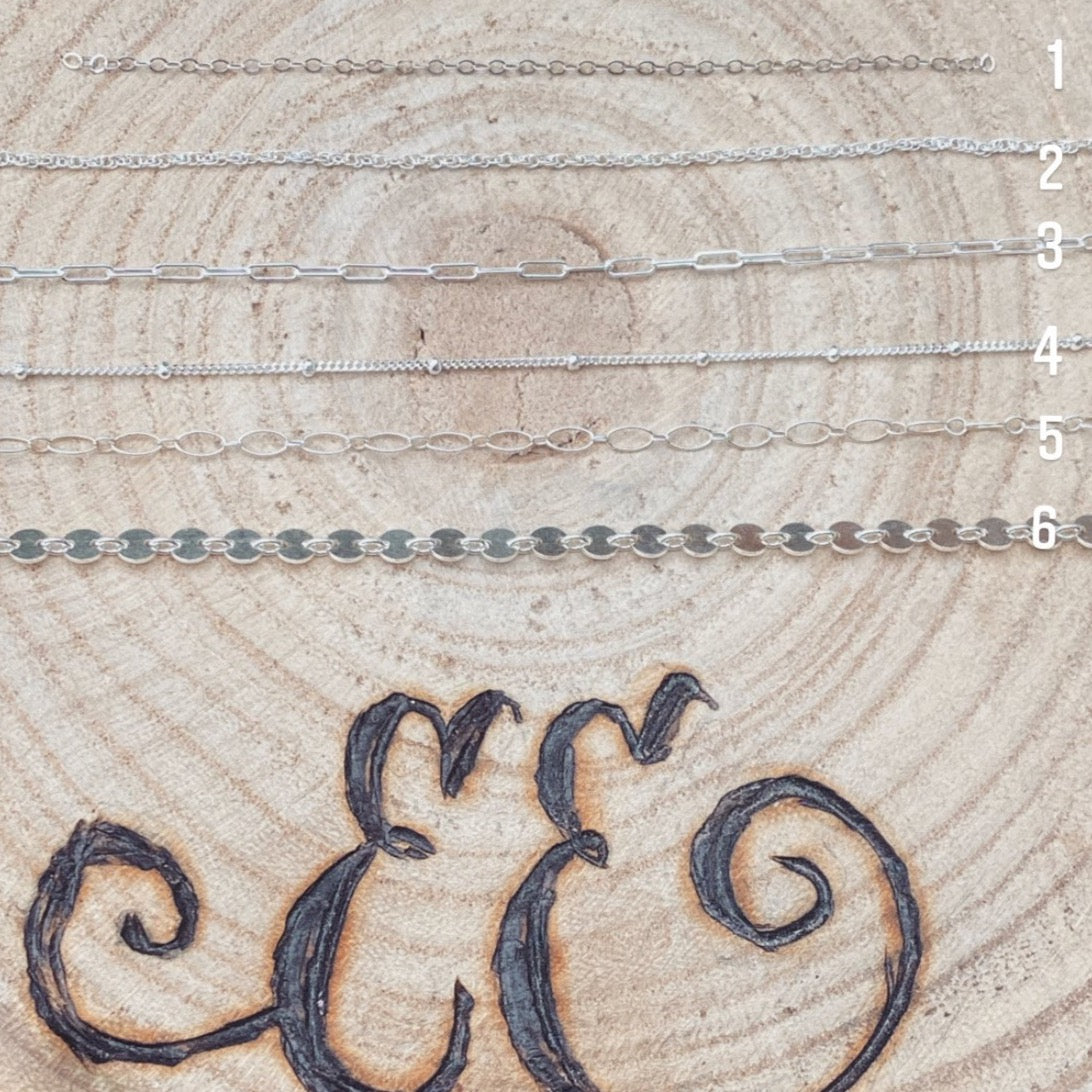 Crescent pearl necklace