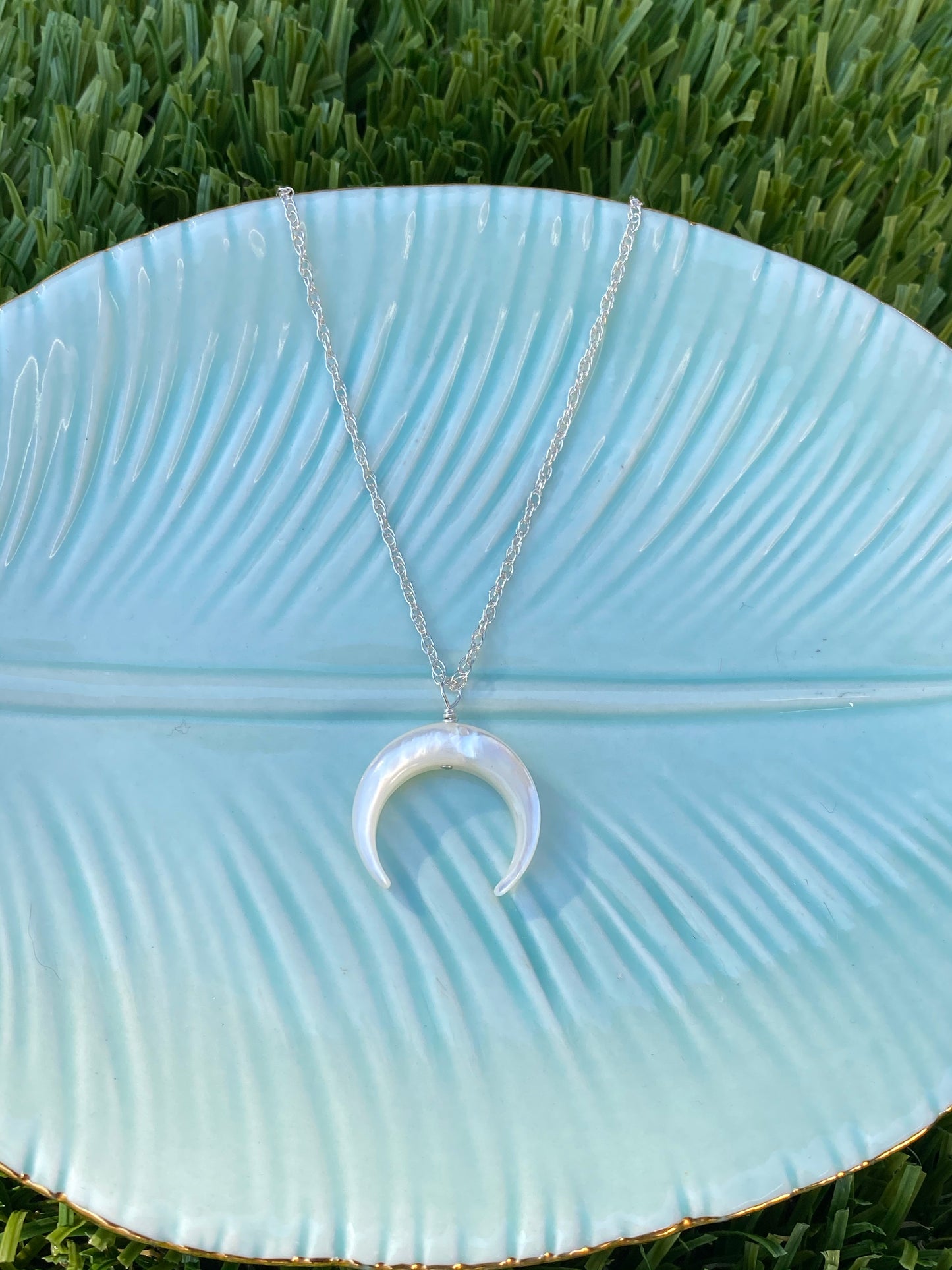 Crescent pearl necklace