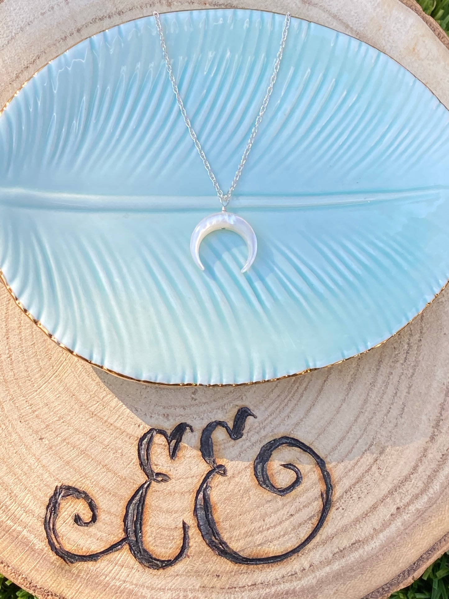 Crescent pearl necklace